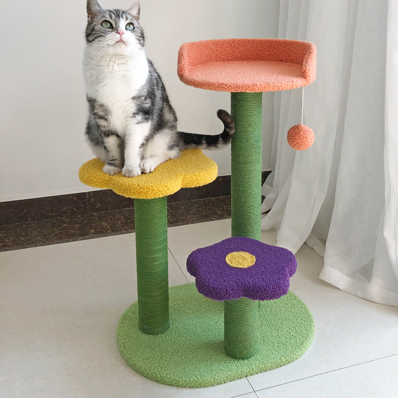 Flower cat tree stand with a cat lounging on it in a cozy, small room setup